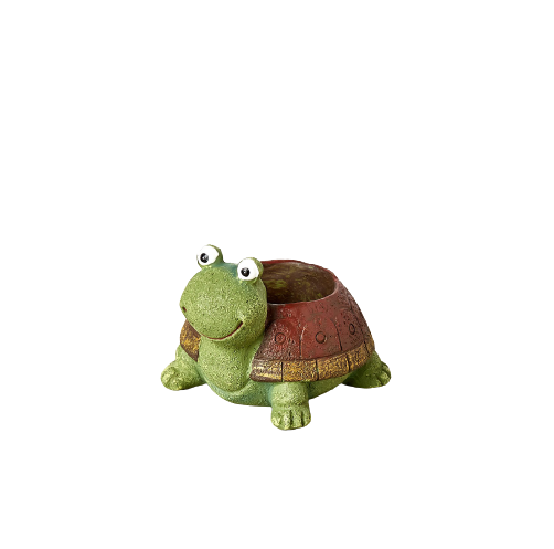 A turtle planter against a black background.